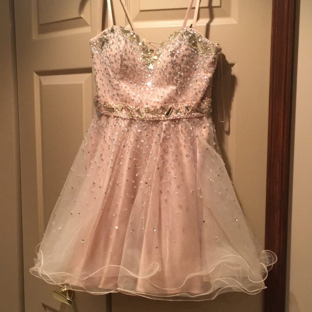 Women’s strapless, jeweled dress